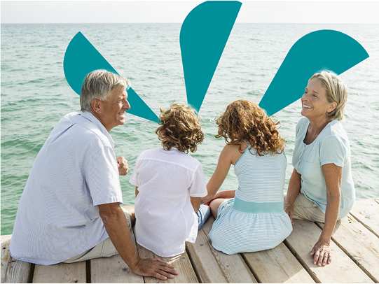 Smiling family sitting on deck
