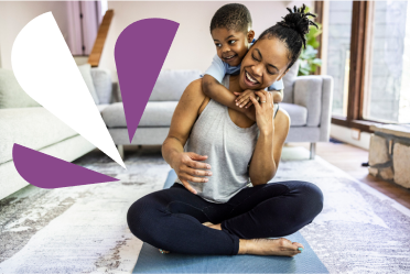 Image of mother and child on yoga mat
