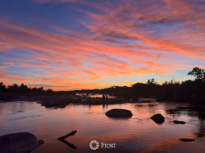 A Summer Sunset Over the River