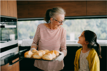 Image of grandmother and grandchild baking