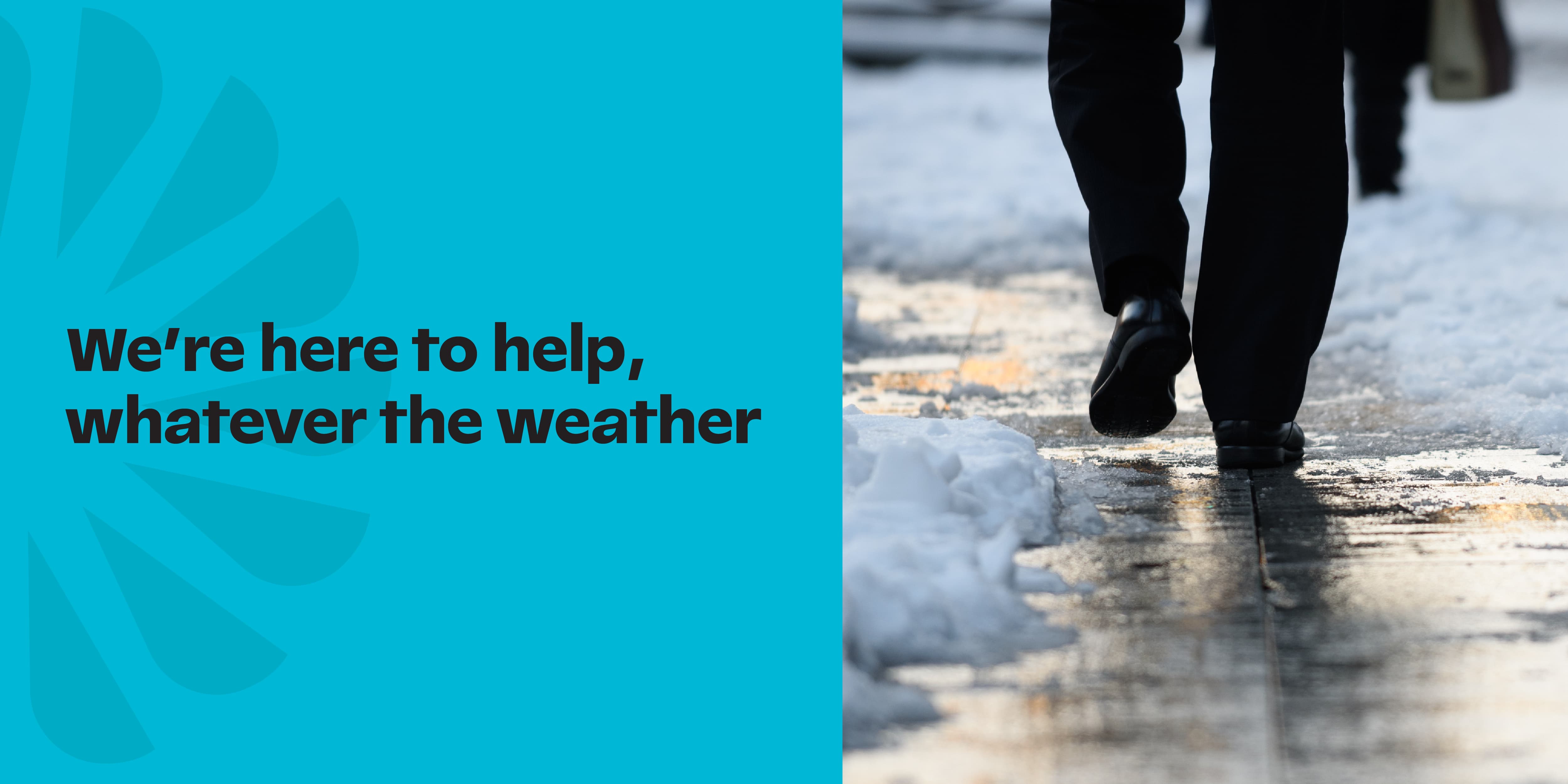 A person walking on snowy sidewalk